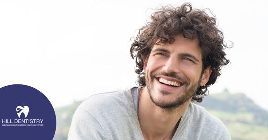 man smiling outdoors